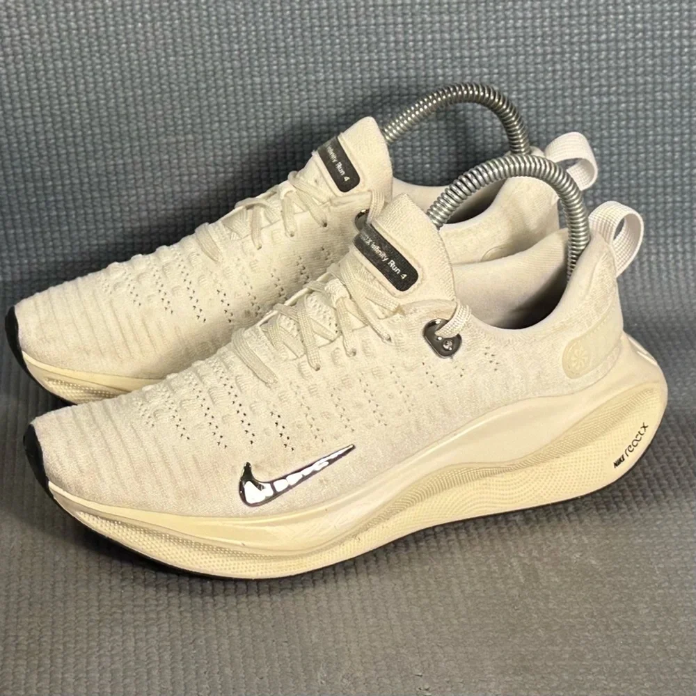 Nike Women's White Cream Running Shoes with Black Swoosh
